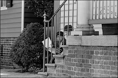 Visitors resting on steps