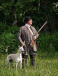 Interpreter Edward Merkley and his greyhound Heather