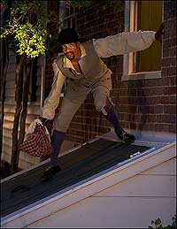 Interpreter Richard Josey portrays one of many slaves who escaped in cities,
as notices for their return attest.