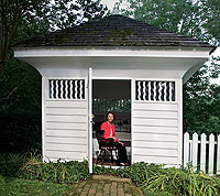 Nancy Campbell, wife of Colonial Williamsburg president Colin Campbell, in her Coke-Garrett office, formerly a dairy.  