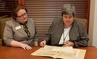 At the Swem Library, Amy Schindler, left, and Beatriz Hardy.