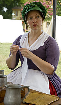 A camp follower of the British Army during “Under the Redcoat.”